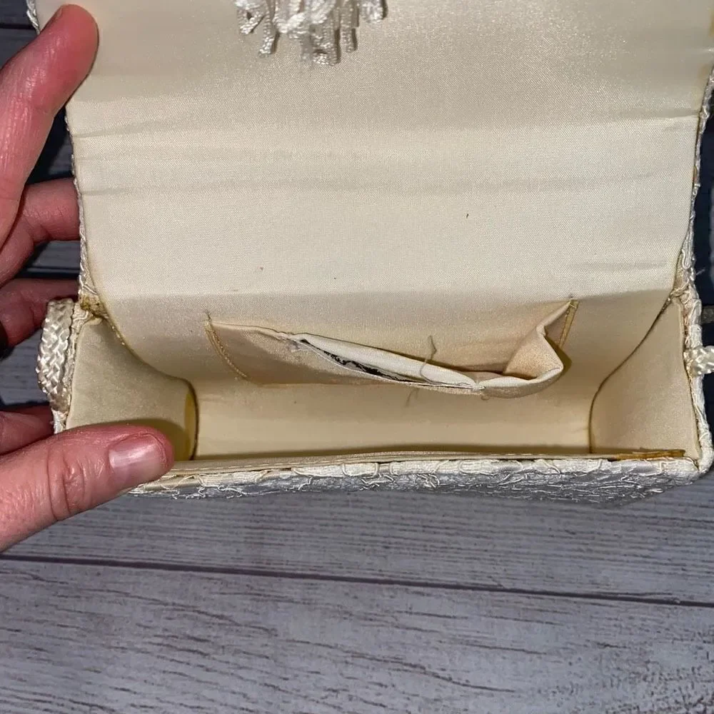 La Regale LTD vintage lace clutch w/nylon chord strap & fringe tassle white